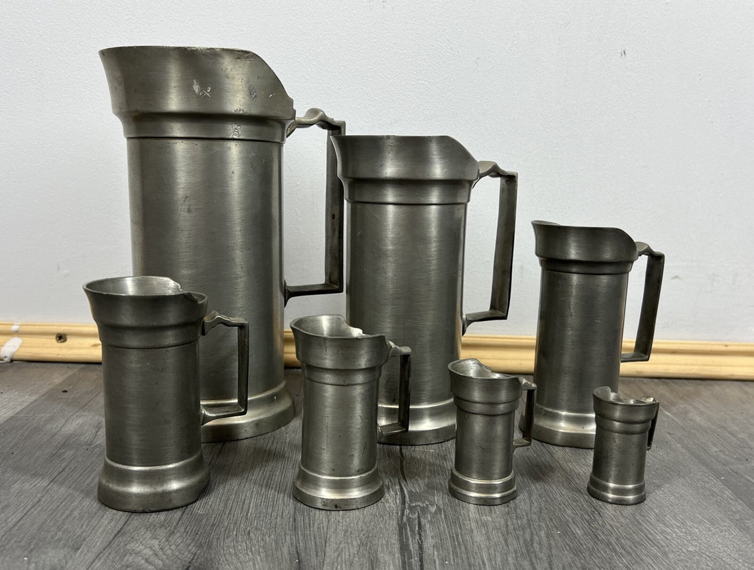 Vintage Signed Seven Piece Pewter Jug Set Graduated Pitchers Decorative Lot 5501