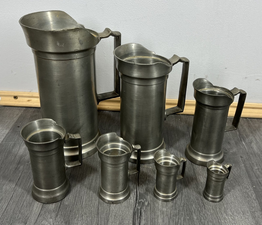 Vintage Signed Seven Piece Pewter Jug Set Graduated Pitchers Decorative Lot 5501